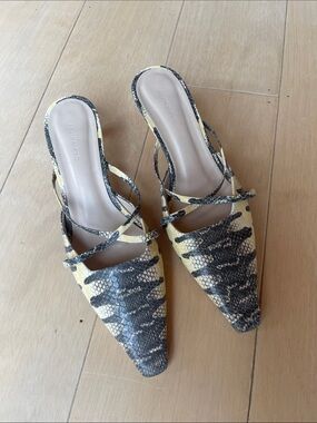 REJINA PYO
Snake Print Mules In Yellow